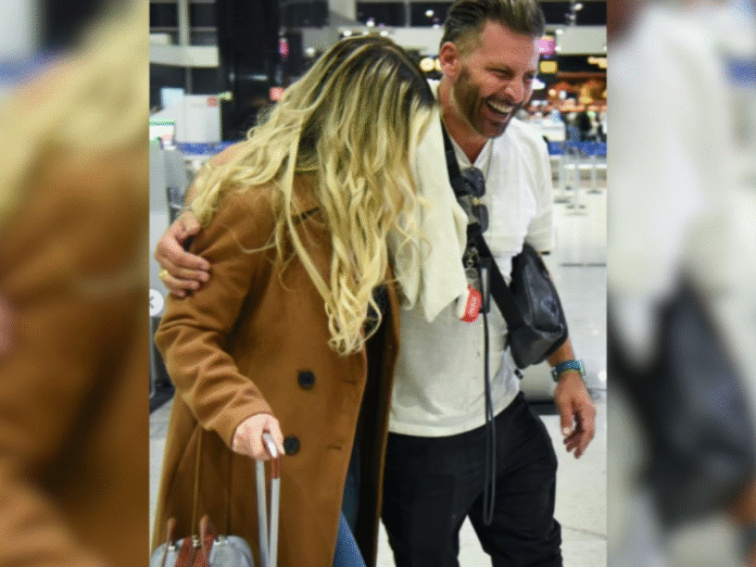 Henry Castelli é flagrado em clima de romance no aeroporto (Foto: Reprodução)