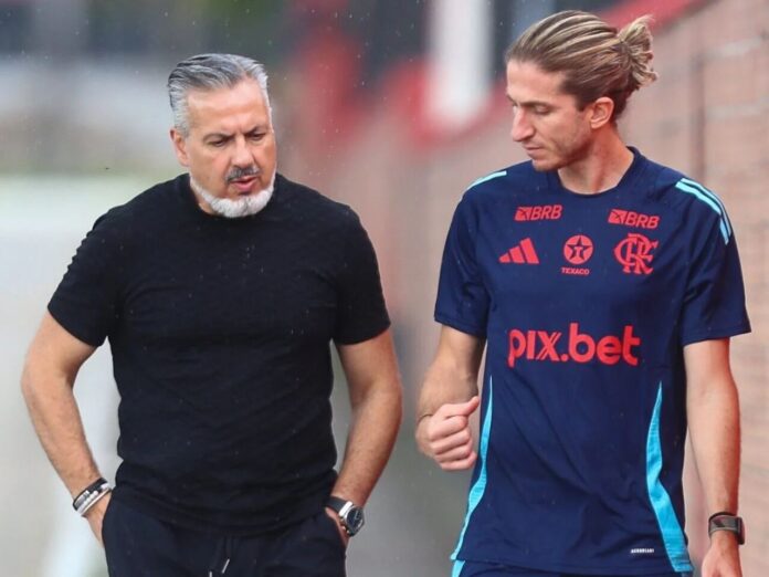 José Boto e Filipe Luís trocam figurinhas no Flamengo (Foto: Divulgação/CRF)
